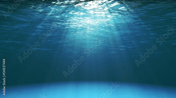 Obraz Ciemnoniebieska powierzchnia oceanu widziana spod wody