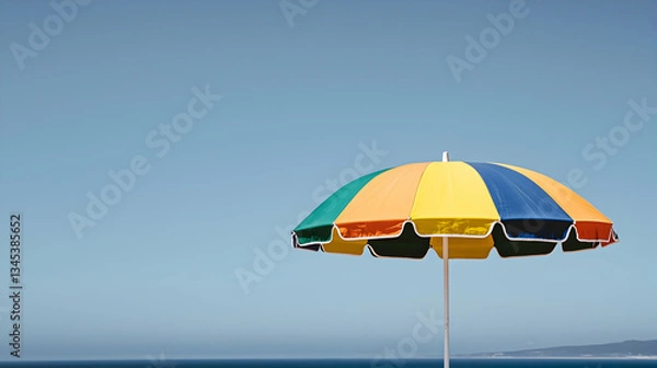 Fototapeta Colorful Umbrella On Beach With Bright Sky