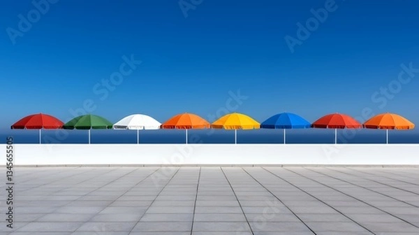 Fototapeta Colorful Beach Umbrellas Against Clear Blue Sky and Modern Architecture