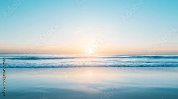 Fototapeta Sunrise over a calm ocean, symbolizing new beginnings and fresh starts