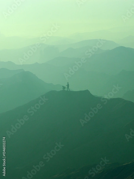 Obraz A view of sand dunes, layers and fog in bromo mountain during sunrise. This view can be seen from Bromo Mountain peak. 