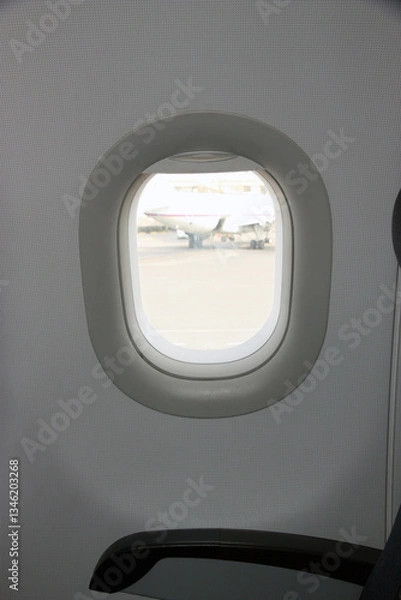 Fototapeta Window on the plane close up