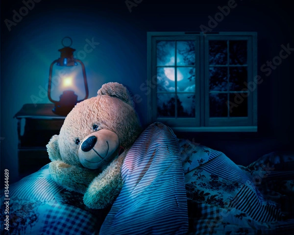 Fototapeta teddy bear in bed.
