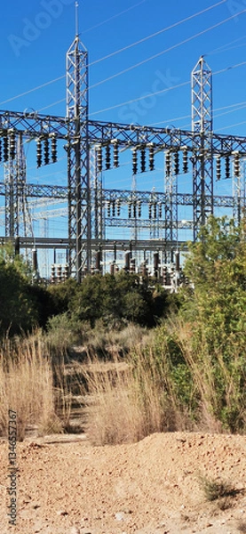 Obraz View of a large electrical substation, highlighting the complexity of its cables and structures