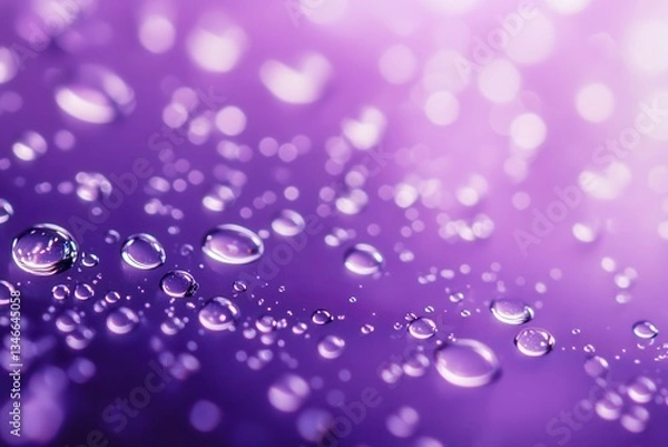 Fototapeta Vibrant purple background with scattered water droplets.