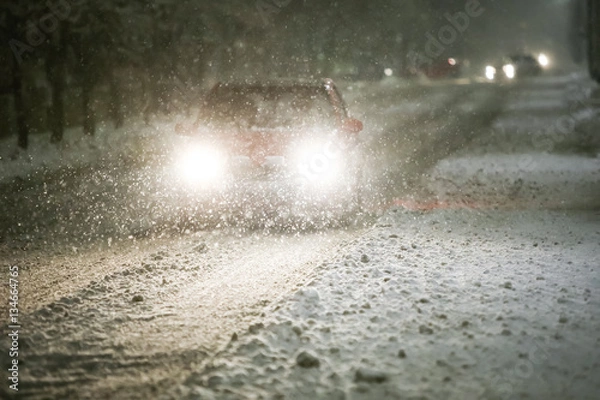 Obraz Car on snowy road