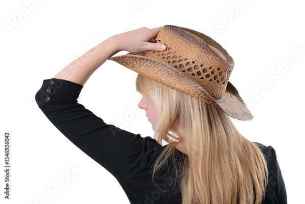 Obraz cowgirl holding her hat