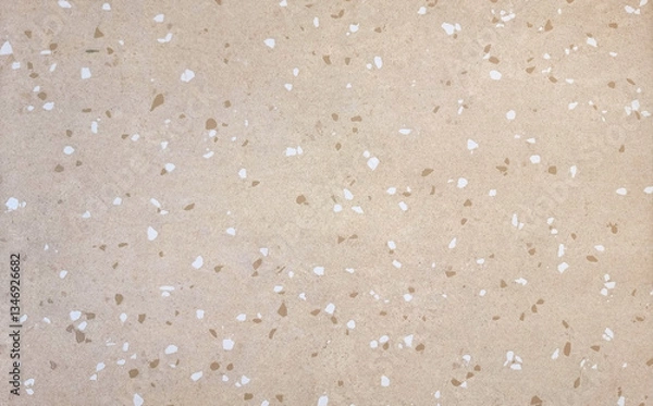 Fototapeta light beige terrazzo texture with scattered white and brown flecks, suitable for backgrounds or interior design applications, showcasing a neutral stone surface with a subtle, speckled pattern.