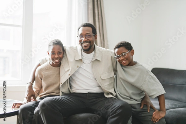 Fototapeta Father and two childs having great time on the livingroom