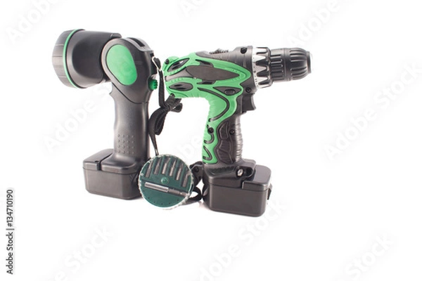 Fototapeta Screwdriver with a flashlight on a white background