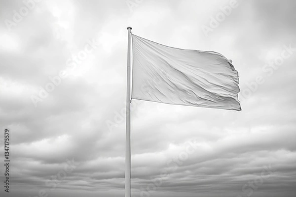 Fototapeta A minimalistic image of a white flag waving on a flagpole against a cloudy sky