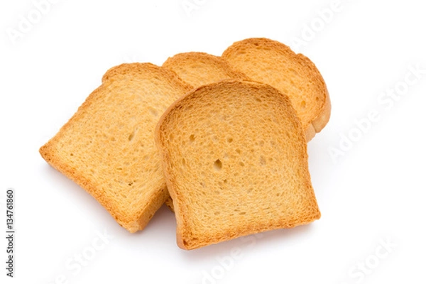 Fototapeta Slices of toast bread on wooden table, top view.