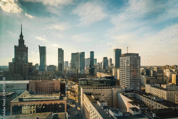 Fototapeta Warsaw city center, a window view to the capitol of Poland. Skyscrapers in Warsaw. Office buildings in the business part of the city. Glass and steel structures. Center of Warsaw. Modern office buildi