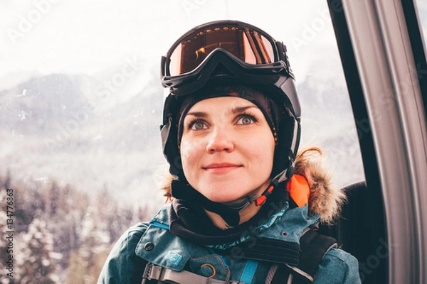 Fototapeta Happy girl on ski resort.