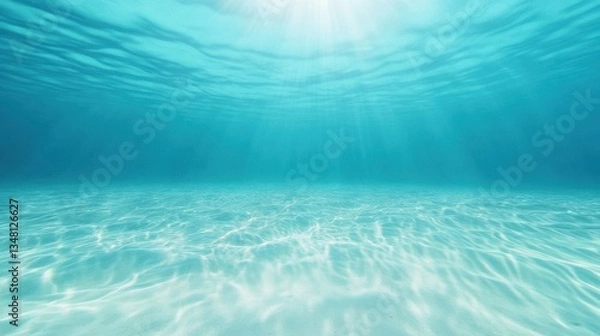 Fototapeta Tranquil Underwater Scene with Sunlight Filtering Through Water Surface