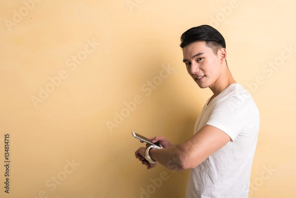 Obraz man using smart watch and phone