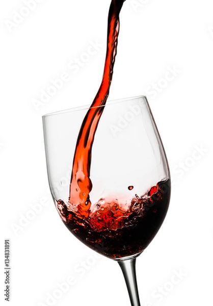 Obraz Red wine poured in a glass isolated on white