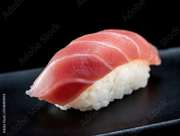 Fototapeta Fresh tuna sushi on dark plate, close-up