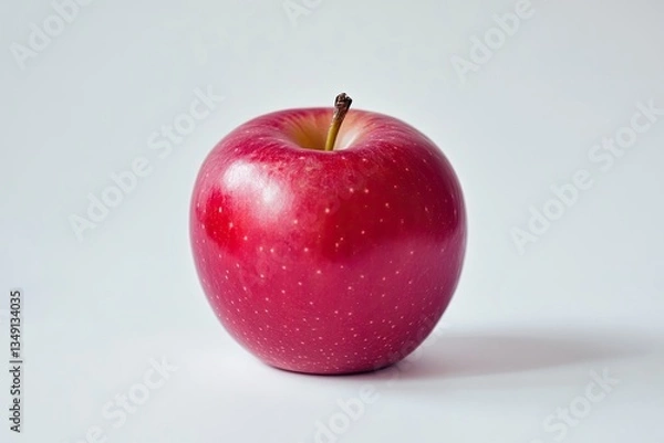 Fototapeta Close-up of a Fresh Red Apple on a White Background