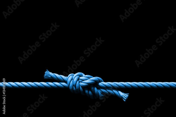 Fototapeta two blue ropes with knot background banner