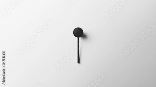 Obraz Minimalist black wall hook on white background