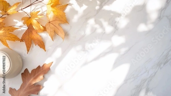 Fototapeta Autumn flat lay with cup of latte and beautiful fall leaves on a marble surface