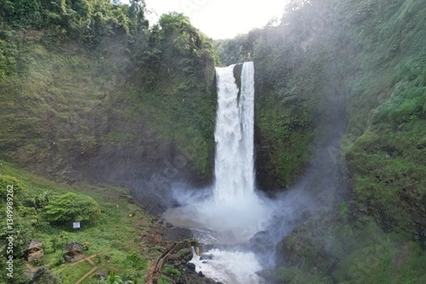 Obraz Beautiful waterfall surrounded by lush greenery in Garut, West Java Indonesia, Curug Sanghyang taraje, Garut, West Java