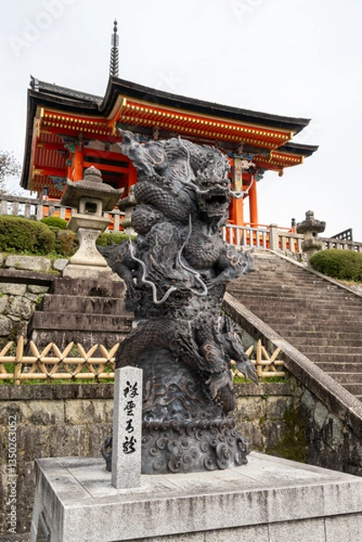 Fototapeta In Kyoto, Japan, a dragon sculpture stands guard at Kiyomizudera and depicts the mythical creature, symbolizing strength, wisdom.