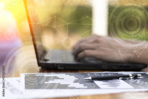 Fototapeta businessman hand working with new modern computer and business s