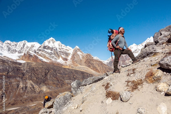 Obraz Team of Mountain Climbers led by Nepalese Sherpa Guide