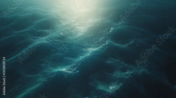 Fototapeta Mesmerizing view of the ocean with sunlight beautifully shining through the water creating stunning aqua shapes and glimmering reflections.