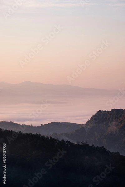 Fototapeta Mountain view on Doi Chang, Chiang Rai Province, northern Thailand at the beginning of the rainy season.