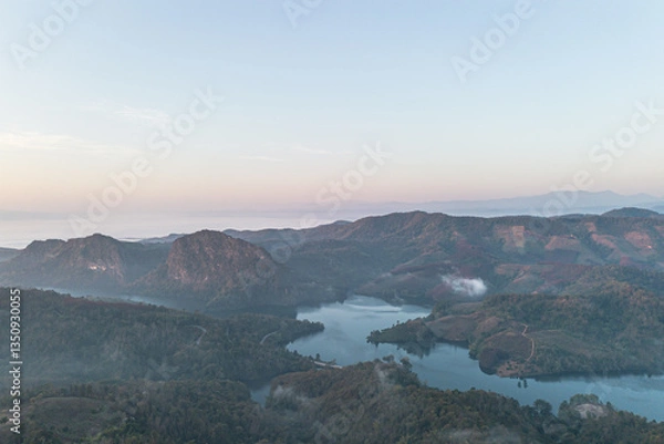 Fototapeta Mountain view on Doi Chang, Chiang Rai Province, northern Thailand at the beginning of the rainy season.