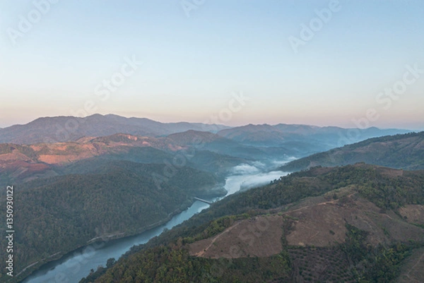 Fototapeta Mountain view on Doi Chang, Chiang Rai Province, northern Thailand at the beginning of the rainy season.