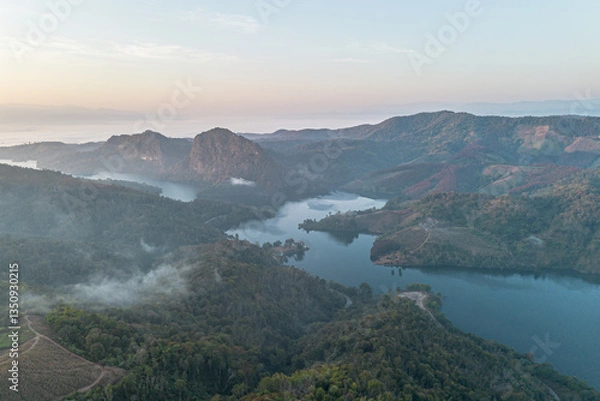 Fototapeta Mountain view on Doi Chang, Chiang Rai Province, northern Thailand at the beginning of the rainy season.