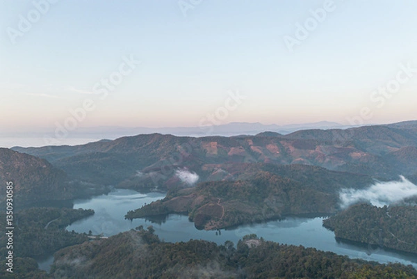 Fototapeta Mountain view on Doi Chang, Chiang Rai Province, northern Thailand at the beginning of the rainy season.