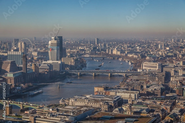 Obraz a view of river Thames in London on a sunny day with visible smog, air pollution
