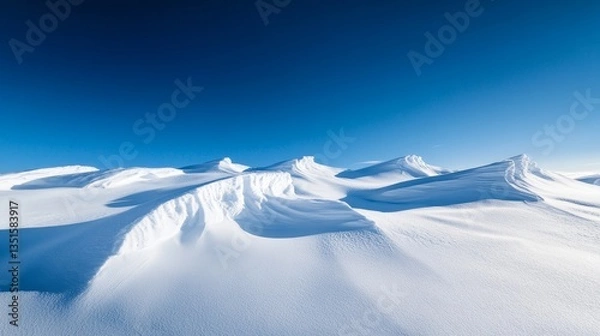 Obraz A deep blue Arctic sky contrasting with pure white snow. 
