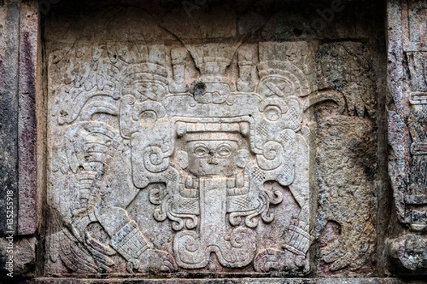 Fototapeta Ancient Mayan murals decorating the Venus Platform at Chichen Itza, Yucatan, Mexico
