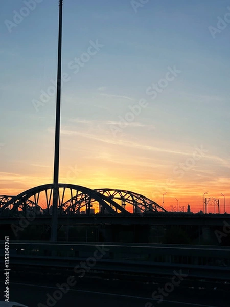 Obraz bridge over the river at sunset