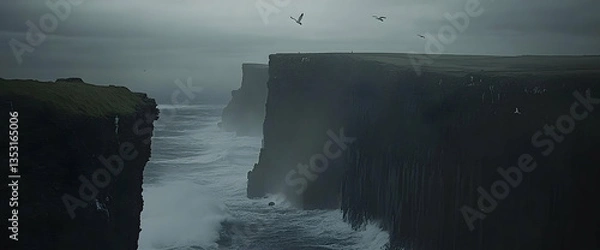 Fototapeta Dramatic coastal cliffs, ocean waves crash, birds fly, moody sky, travel photography