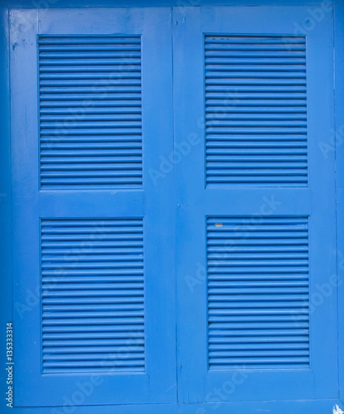 Obraz The blue wooden window frames in white