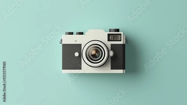 Obraz An old vintage camera resting on a soft blue background evoking nostalgia and memories of photography's past