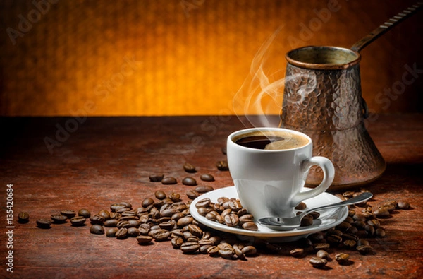 Obraz Coffee cup and saucer on a wooden table