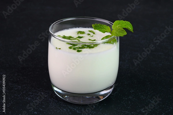 Obraz Serving Indian buttermilk in a glass cup.