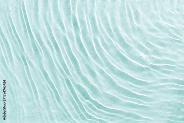 Fototapeta Close up view of sunlit water surface with gentle ripples with light reflections. Crystal clear water with sunlight soft wavy patterns. Abstract nature minimal background, natural textural backdrop