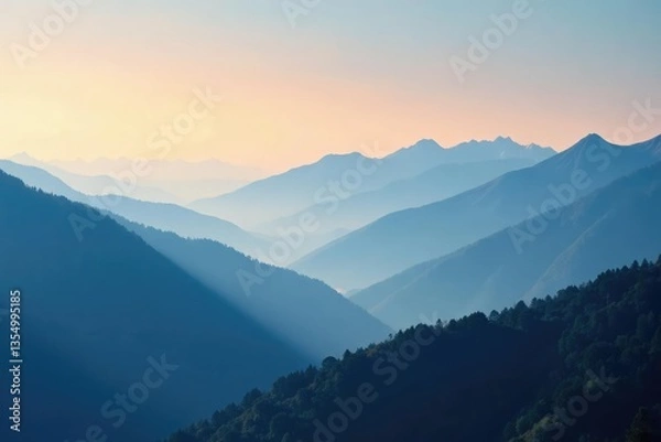 Fototapeta Misty dawn in mountainscape with serene blue hues and gentle peaks, cloud covered, mountain range, calm atmosphere