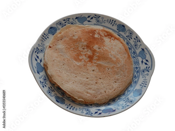 Obraz Tasty crepe on the white blue patterned plate.