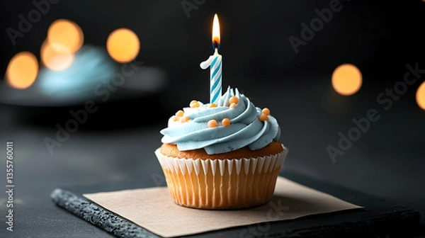 Fototapeta Single Blue Frosted Cupcake with Number One Candle