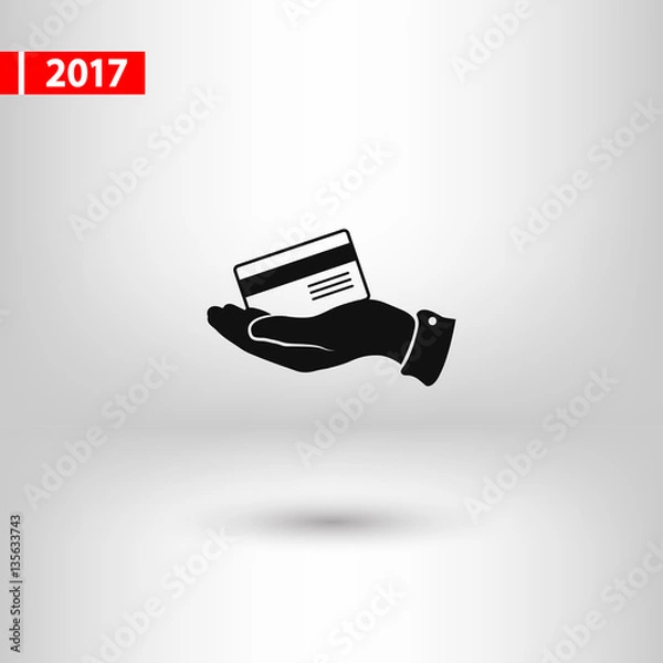 Fototapeta Bank credit card with hand, vector illustration. Flat design style